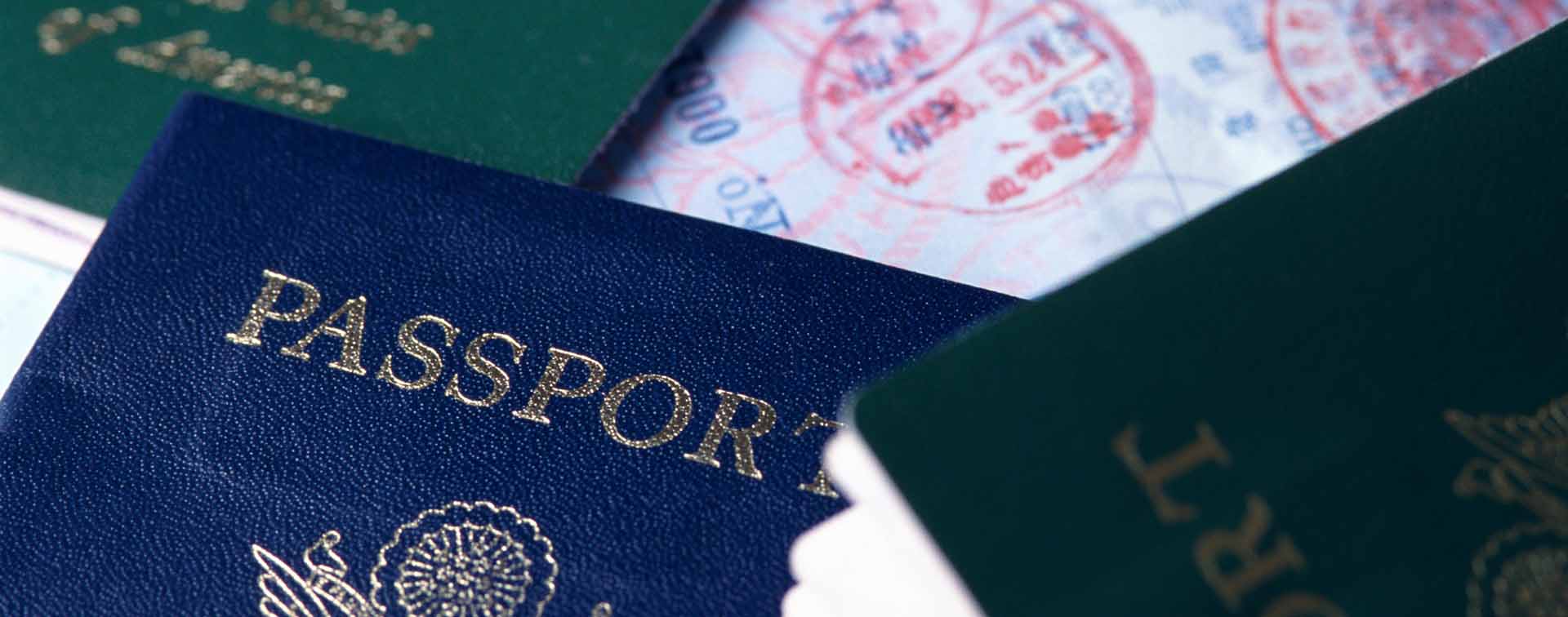 American passports on top of other opened passports